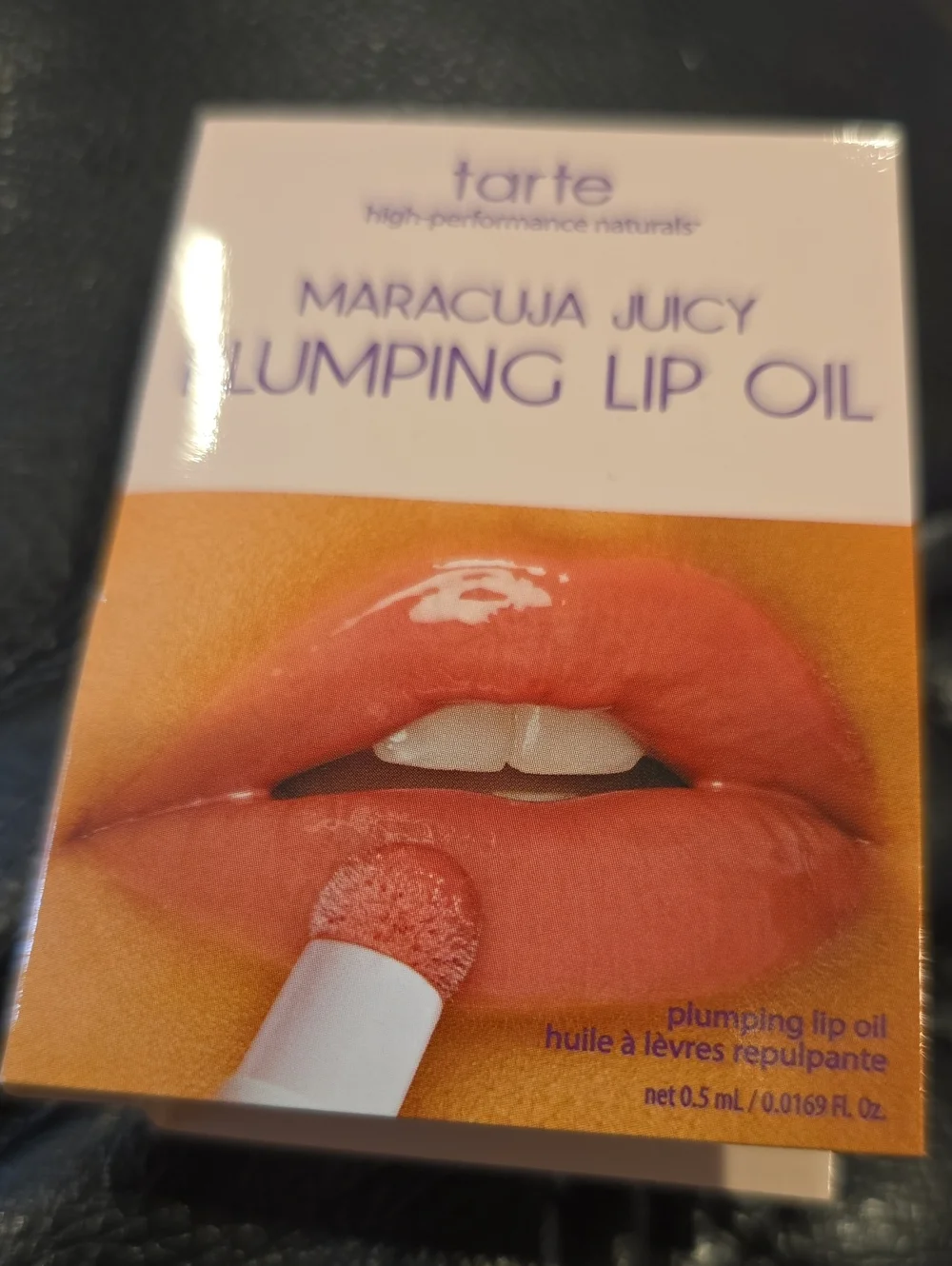 TARTE MARACUJA JUICY PLUMPING LIP OIL.